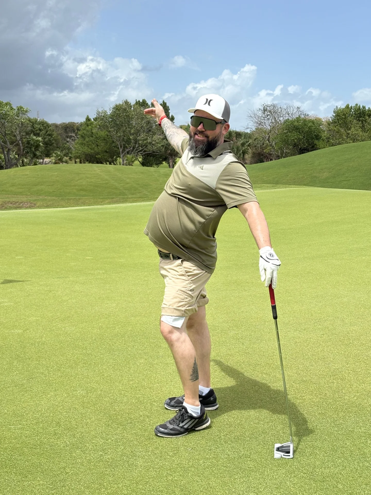 Plaid Jacket golfer on the putting green
